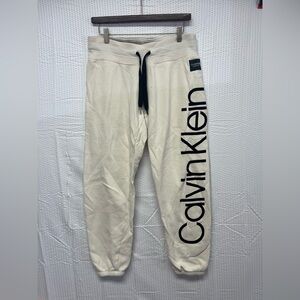 Calvin Klein Cream Sweatpants with Black Velvet Lettering